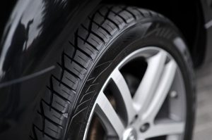 Up Close of Car's Tire on Road