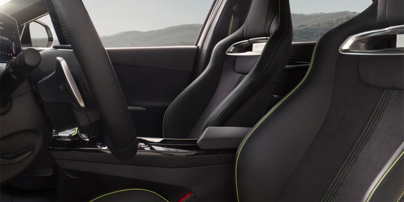 close up of 2024 kia ev6 front seats with green stitching